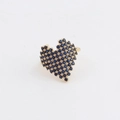 Detailed macro of gold heart ring with blue zircon stones and pixelated edges - Adjustable Open / Gold Royal Blue Zirconia
