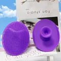 Pair of purple silicone facial cleansing brushes with soft bristles and suction handles - Lilac Purple