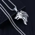 Detailed close-up of a silver stainless steel wolf head pendant on a black gift box - Wolf Head + Stainless Steel Chain