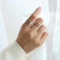 Minimalist silver geometric open rings with pearls shown as a stacked set on fingers - US 7 / Silver