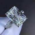 Minimalist ring with a large radiant cut cubic zirconia and pavé set silver band - US 6 / White Gold
