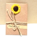 Vintage kraft paper card with a small yellow sunflower and tied with a rustic jute bow - Sunflower