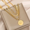 Three-layer gold necklace with snake chain, curb chain, and French coin portrait pendant - Gold