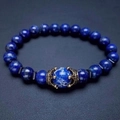 Lapis lazuli beaded bracelet with a vintage gold crown charm and blue marble bead - Lapis Lazuli Emperor Stone
