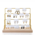 Four-tier gold metal earring stand with solid wood base for jewelry organization - 4 Layers / Gold