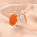 Close-up of cute transparent orange slice hair claw clip for girls and babies - Orange Slice Claw Clip