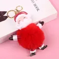 Llavero navideño de pompón de Papá Noel en cuero sintético rojo y anillo dorado - Abuelo Noel