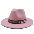 Detailed view of pink fedora hat with rainbow ribbon band, pearls and white flower ornament - Pink