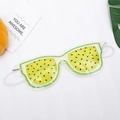 Sleep mask with yellow fruit design and cooling gel, featuring elastic ear straps - Golden Kiwi / Yellow