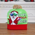 Festive LED Christmas knit hat with Santa pattern and colorful lights on wooden table - Green Sunglasses Santa
