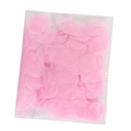 Detailed view of pink round paper confetti in a clear polybag for gender reveal - Pink Round Confetti