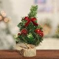 20cm mini Christmas tree with red ribbon bows and burlap base on wooden surface - Burlap Mini Tree - Red