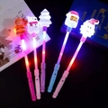 Light-up Christmas magic wand set featuring Santa and Snowman in pastel colors - Christmas Glow Stick