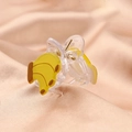 Cute banana acetate hair claw clip for kids on a soft pink background fabric - Banana Claw Clip