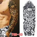 Polynesian style full arm temporary tattoo with Tiki masks and palm leaf patterns - Tribal Mask Floral Style (TQB-33)