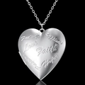 Detail of silver heart locket pendant engraved with Hope Love Faith and Passion words - Alloy / Emotional Words Heart / Silver