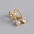 Macro detail of gold S925 sterling silver huggie earrings with round cubic zirconia - 925 Silver / Gold Color (Pair)