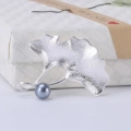 Elegant matte silver ginkgo leaf brooch featuring a sophisticated dark grey pearl - 1302-Silver Ginkgo Leaf Pearl