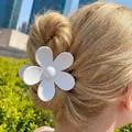 Elegant white matte floral hair claw clip shown on a hairstyle in natural outdoor lighting - 7cm / Light Gray