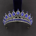 Close-up of Baroque crown featuring blue water-drop crystals and vintage bronze finish - Antique Bronze With Royal Blue