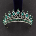 Detail shot of vintage baroque bridal crown with emerald green teardrop crystals - Antique Bronze With Green