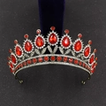Macro detail of Baroque bridal crown with red teardrop gems and crystal rhinestones - Antique Bronze With Red