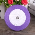6mm purple satin ribbon roll for DIY crafts and gift wrapping on wooden desk - Purple