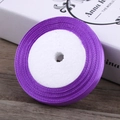 Single roll of 6mm purple satin ribbon with a glossy finish on white foam spool - Deep purple