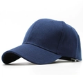 Detail view of navy blue twill cotton baseball cap with six-panel structure and curved brim - Navy Blue