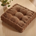 Thick coffee brown corduroy seat cushion with 9-hole tufted design on wooden floor - Cayenne Camel (Square)