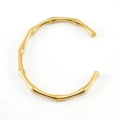 Brazalete de acero inoxidable dorado pulido con diseño de bambú para mujer en estilo minimal - Dorado