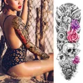 Detail of waterproof full arm temporary tattoo featuring angel, roses and skull motifs - Angel Clock Poker Style (TQB-14)