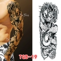 Waterproof full arm temporary tattoo featuring a large black dragon design on a male model - Full Arm Black Dragon Style (TQB-19)
