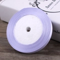 Single roll of 6mm light purple satin ribbon with a smooth silk finish for gift wrapping - Micro Purple