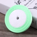 Light green 6mm wide fabric ribbon roll with woven texture for gift wrapping and DIY crafts - Mint Green