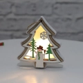 Detail view of a wooden Christmas tree pendant with warm LED lights and snowman carving - Christmas Tree
