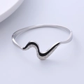 Polished wavy titanium steel bracelet with black and white crystal inlay for women - Black White Zirconia Wave Bangle / Silver