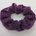 Elegant purple glitter scrunchie featuring shimmering metallic thread and elastic pleats - Purple