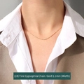 Elegant 1.1mm gold sparkling star chain necklace shown on a model neck - Thin Starry Chain 40+5cm / Gold
