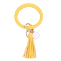 Detail of yellow PU leather wristlet keychain with golden metal ring and soft fringe tassel - Goose Yellow