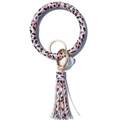 Detail view of pink leopard print PU leather wristlet with golden keyring and tassel - Pink Leopard