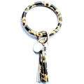 Détail du bracelet porte-clés en cuir PU à motif tournesol avec pompon doré et fermoir - Tournesol