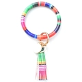 Detail view of colorful tie-dye PU leather wristlet keychain with fringe tassel and gold ring - Tie-dye Rainbow