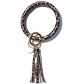 Detail view of leopard print PU leather keychain bracelet with golden clip and fringe tassel - Reddish Brown Leopard