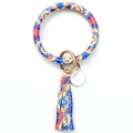 Detail of tie-dye wristlet keychain with leather tassel and gold metal ring - Denim Blue Tie-Dye