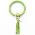 Detail of lime green pebble grain PU leather wristlet keychain with tassel and gold ring - Lemon Yellow
