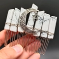 Detail of handmade silver hair comb with natural white stone crystals and moon star charms - Howlite
