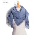 Thick knitted blue-grey winter scarf with tassel edges and solid textured yarn finish - Denim Blue