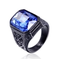 Macro shot of men's black stainless steel ring with a large blue rectangular gemstone - Light Blue Gemstone