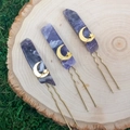 Detailed view of purple amethyst crystal hair pins with gold moon and star accents - Amethyst + Gold Moon Star